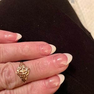 Solid 10k yellow gold ring. Makes a cute pinky or midi ring!